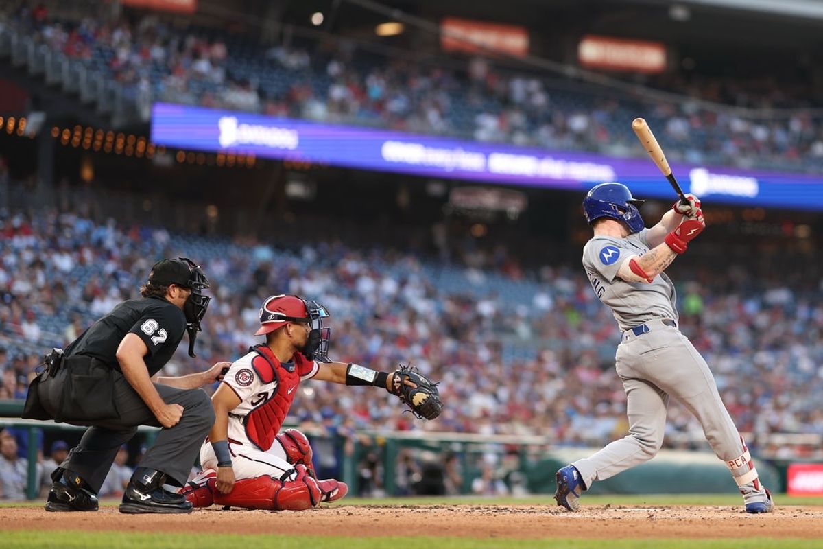 Aug 11, 2026; Washington, District of Columbia, USA; Chicago Cubs center fielder Pete Crow-Armstrong (4) hits a solo home run against the Washington Nationals during the third inning at Nationals Park. Mandatory Credit: Geoff Burke-Imagn Images