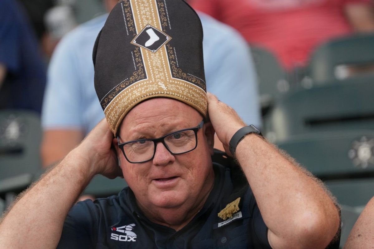 Aug 11, 2026; Chicago, Illinois, USA; The Chicago White Sox gave away promotional Pope hats before a game between the Chicago White Sox and the Cincinnati Reds at Rate Field. Mandatory Credit: David Banks-Imagn Images
