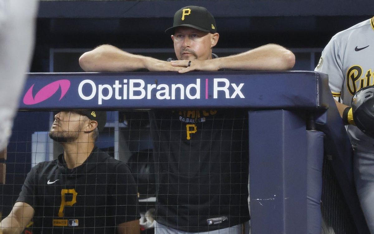 Aug 11, 2026; Miami, Florida, USA;  Pittsburgh Pirates manager Don Kelly (12) leans on the dugout against the Miami Marlins during the first inning at loanDepot Park. Mandatory Credit: Rhona Wise-Imagn Images