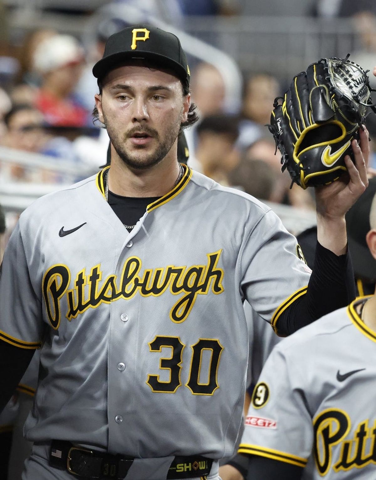 Aug 11, 2026; Miami, Florida, USA;  Pittsburgh Pirates pitcher Paul Skenes (30) reacts in the dugout against the Miami Marlins during the fourth inning at loanDepot Park. Mandatory Credit: Rhona Wise-Imagn Images