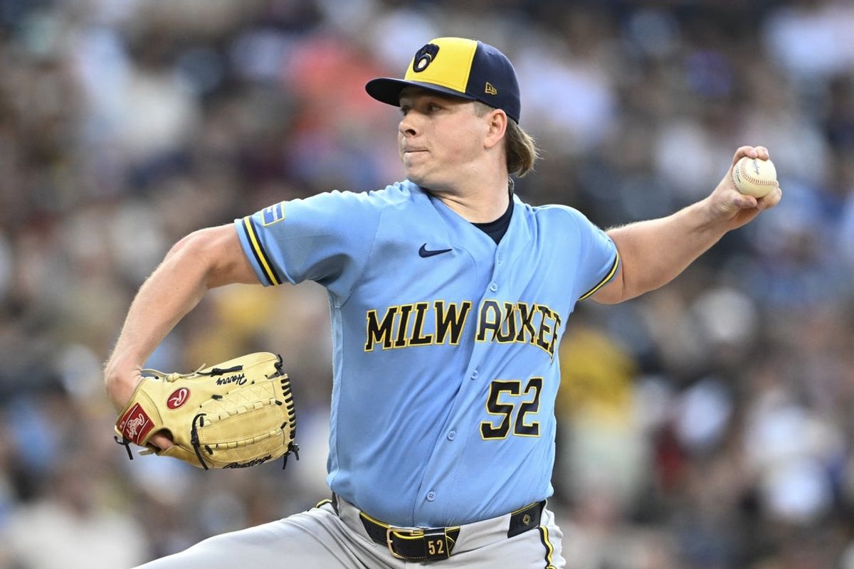 Aug 11, 2026; San Diego, California, USA; Milwaukee Brewers pitcher Kyle Harrison (52) delivers during the first inning against the San Diego Padres at Petco Park. Mandatory Credit: Denis Poroy-Imagn Images