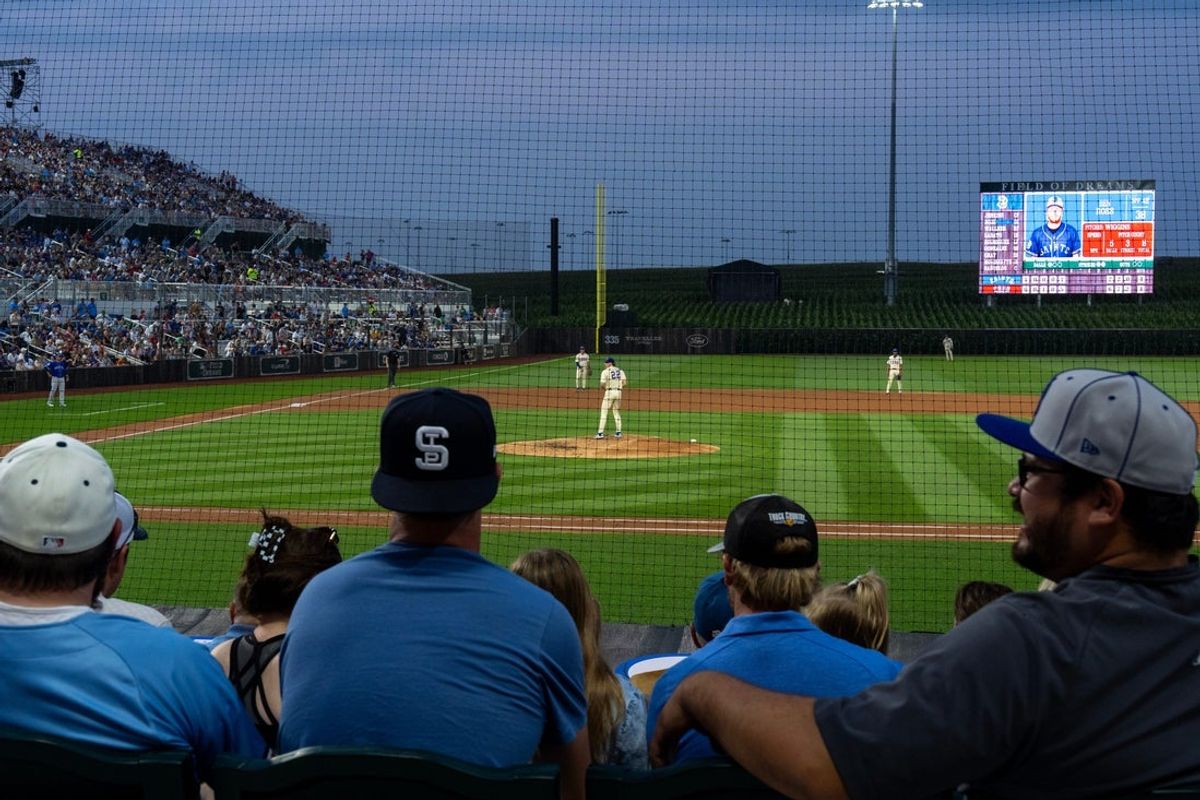 Fans fill the stadium for a minor league baseball game between the Iowa Cubs and the St. Paul Saints Aug. 11, 2026 at the Field of Dreams in Dyersville, Iowa.