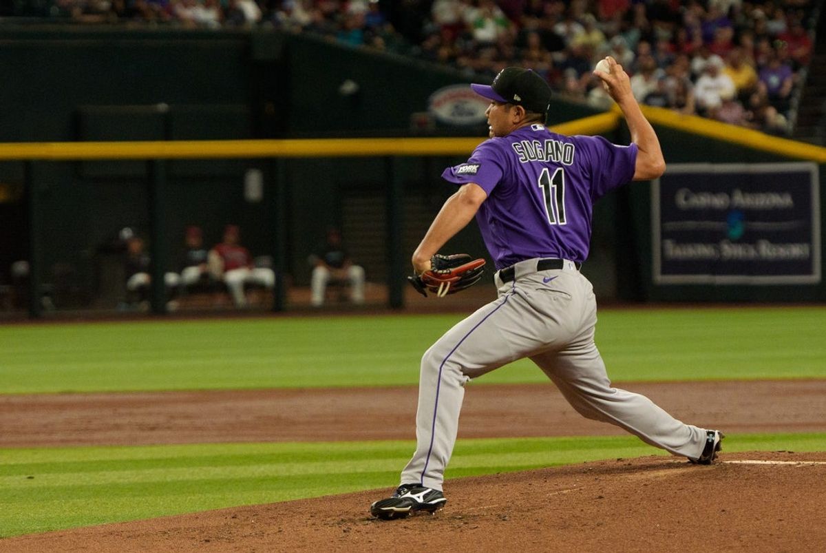 Aug 11, 2026; Phoenix, Arizona, USA; Colorado Rockies pitcher Tomoyuki Sugano (11) delivers a pitch in the second inning of a game against the Arizona Diamondbacks at Chase Field. Mandatory Credit: Allan Henry-Imagn Images