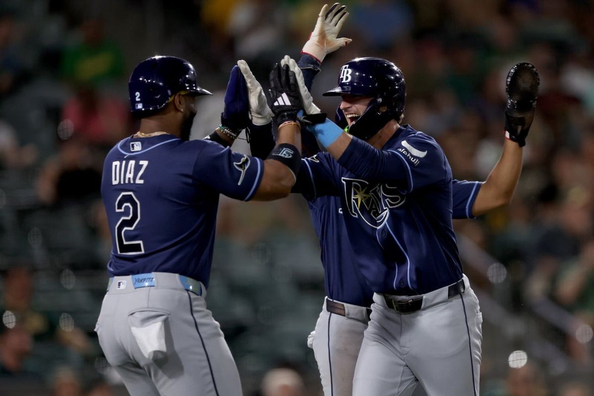 Aug 11, 2026; West Sacramento, California, USA; Tampa Bay Rays pinch hitter Carson Williams (7) celebrates with designated hitter Yandy Diaz (2) after hitting a three-run home run against the Athletics during the eighth inning at Sutter Health Park. Mandatory Credit: Dennis Lee-Imagn Images