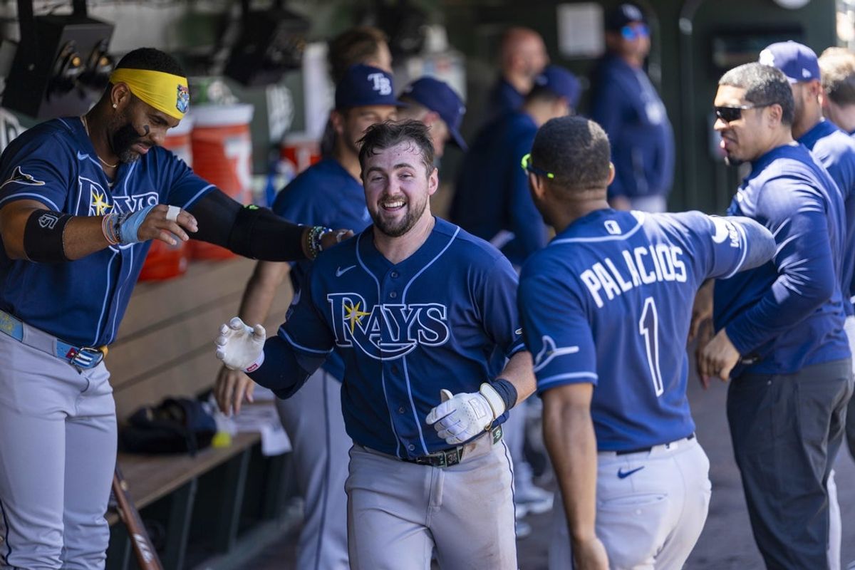 Aug 12, 2026; West Sacramento, California, USA; Tampa Bay Rays catcher Liam Hicks (34) is congratulated by teammates after hitting a three-run home run against the Athletics in the fourth inning at Sutter Health Park. Mandatory Credit: Cary Edmondson-Imagn Images