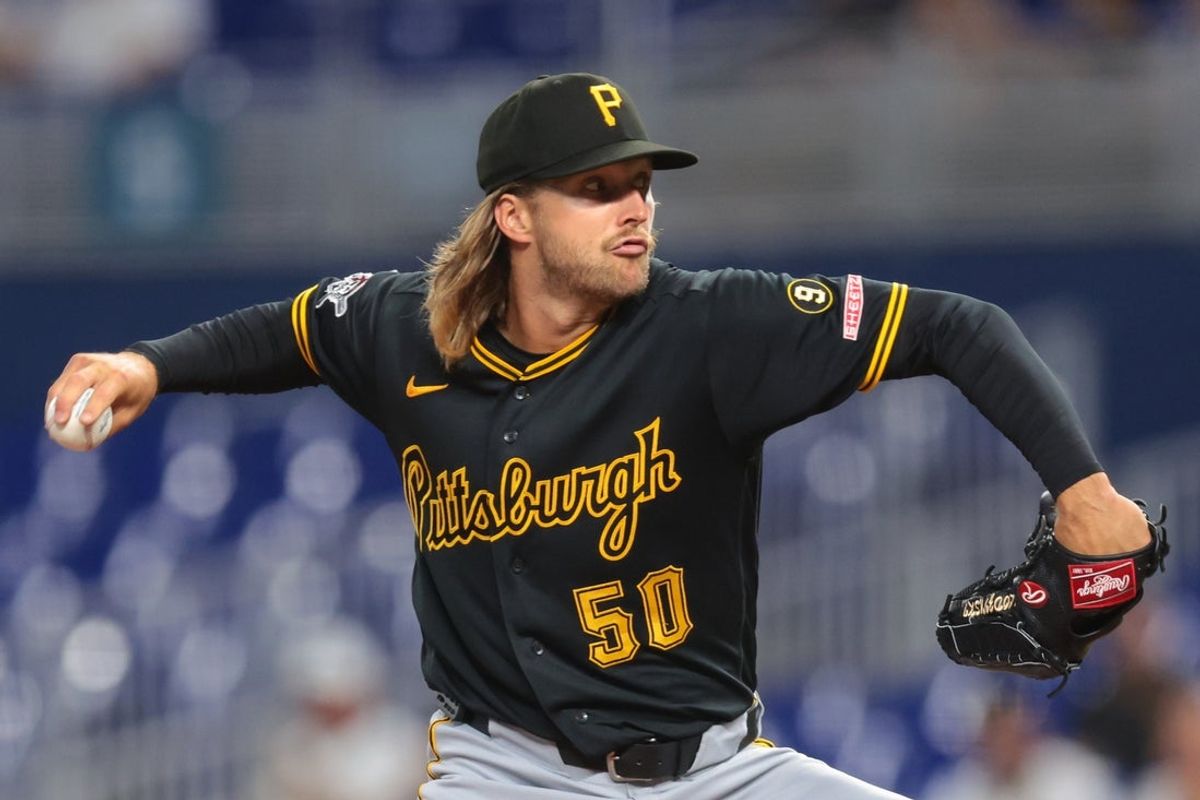 Aug 12, 2026; Miami, Florida, USA; Pittsburgh Pirates starting pitcher Carmen Mlodzinski (50) delivers a pitch against the Miami Marlins during the first inning at loanDepot Park. Mandatory Credit: Sam Navarro-Imagn Images