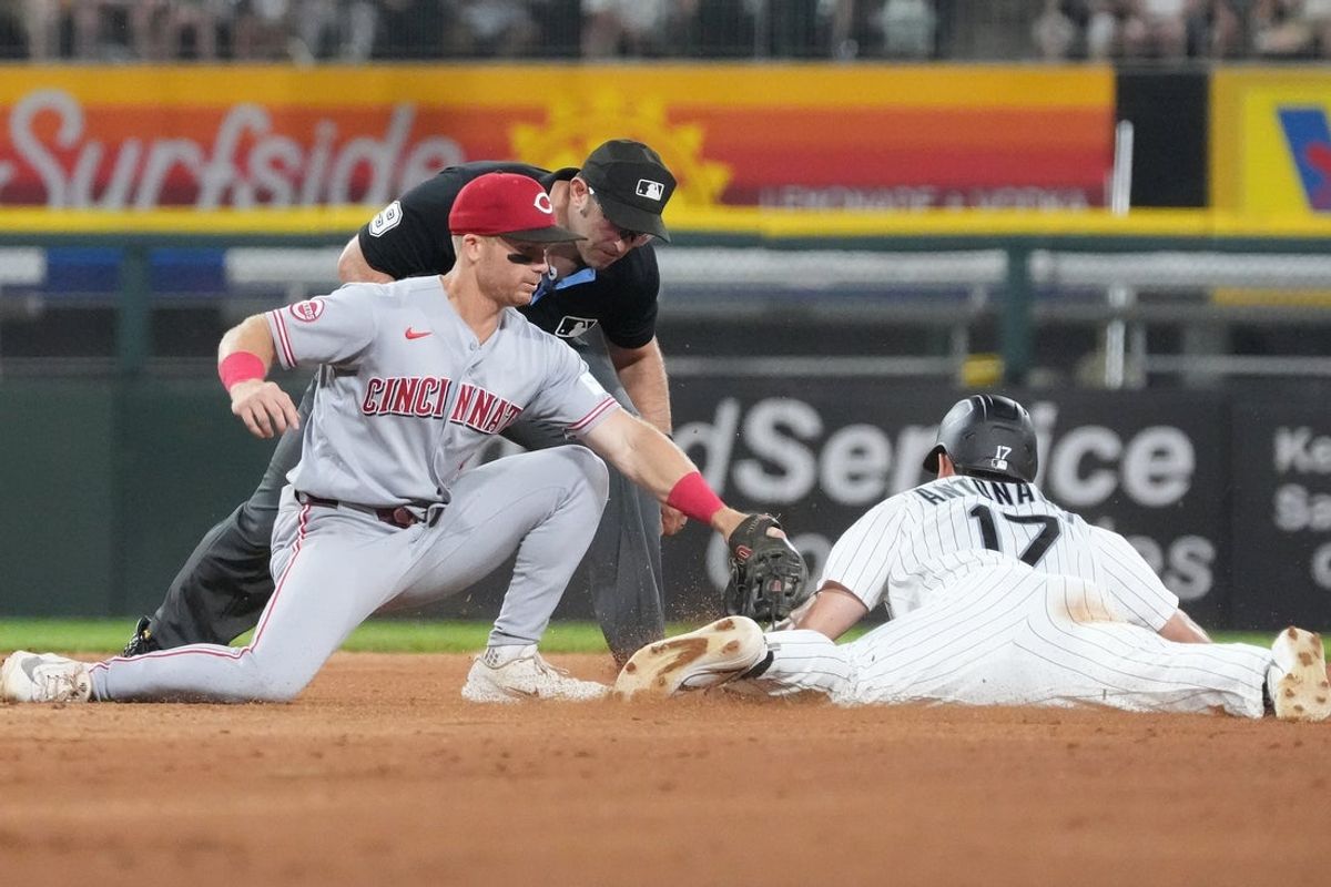 Aug 12, 2026; Chicago, Illinois, USA; Chicago White Sox second baseman Sam Antonacci (17) steals second base as Cincinnati Reds second baseman Matt McLain (9) makes a tag during the seventh inning at Rate Field. Mandatory Credit: David Banks-Imagn Images