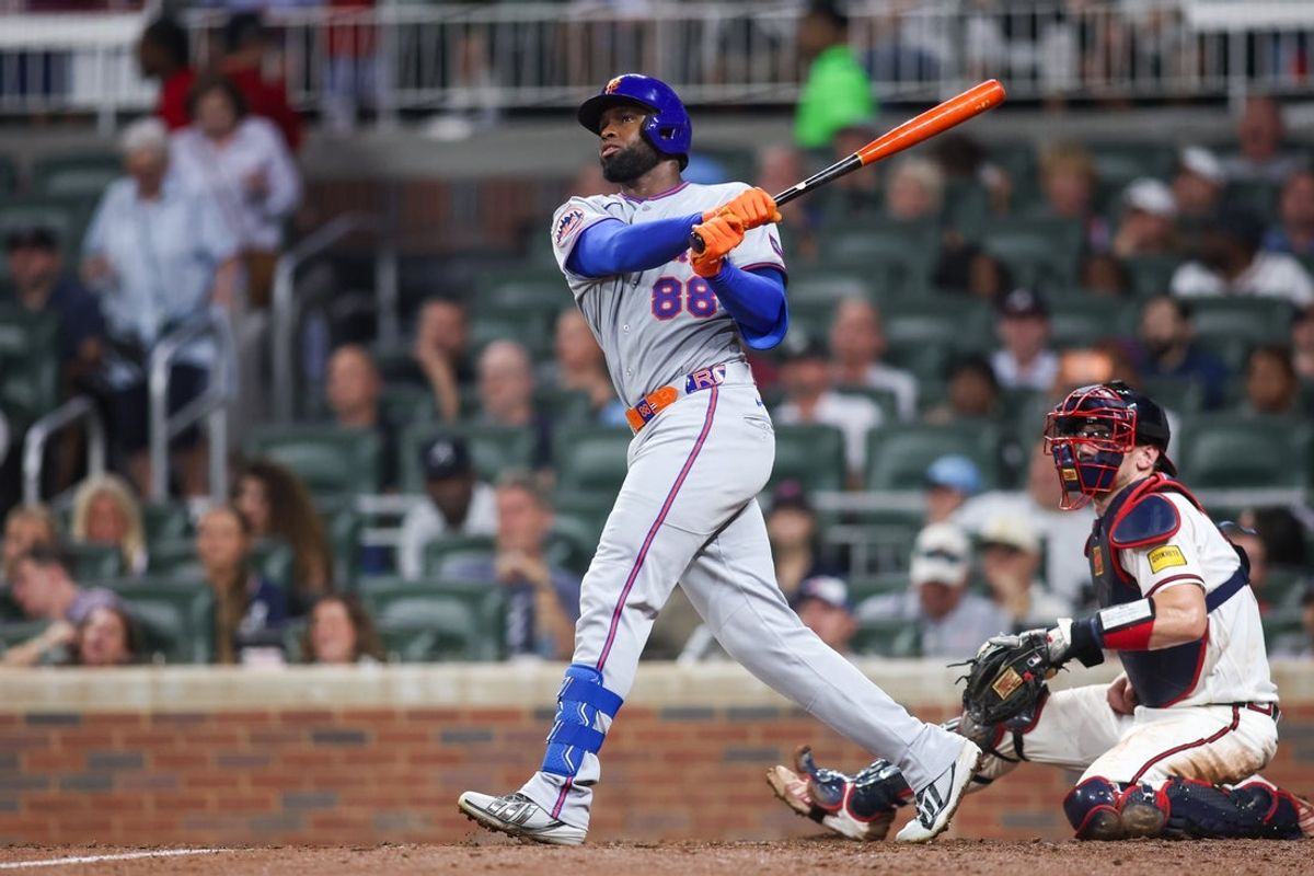 Aug 12, 2026; Atlanta, Georgia, USA; New York Mets center fielder Luis Robert Jr. (88) hits a home run against the Atlanta Braves in the seventh inning at Truist Park. Mandatory Credit: Brett Davis-Imagn Images