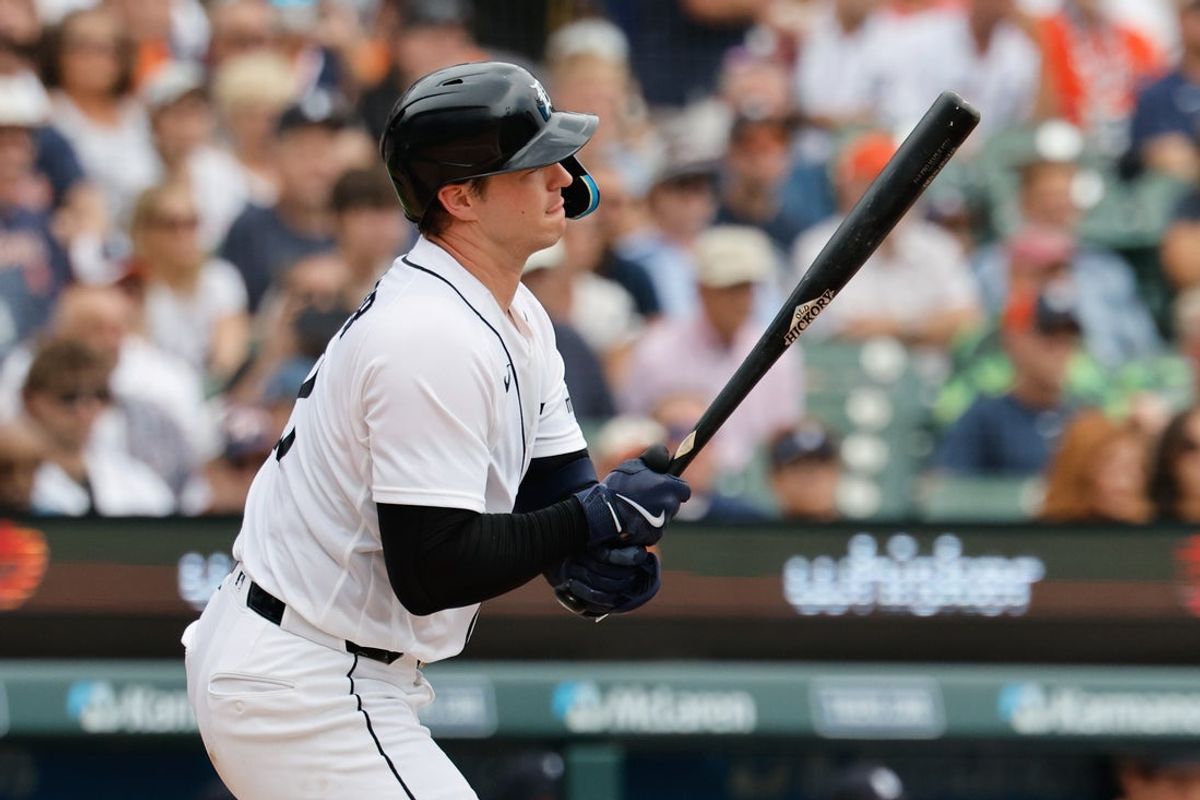 Aug 13, 2026; Detroit, Michigan, USA;  Detroit Tigers catcher Dillon Dingler (13) drives in a run in the third inning against the Cleveland Guardians at Comerica Park. Mandatory Credit: Rick Osentoski-Imagn Images