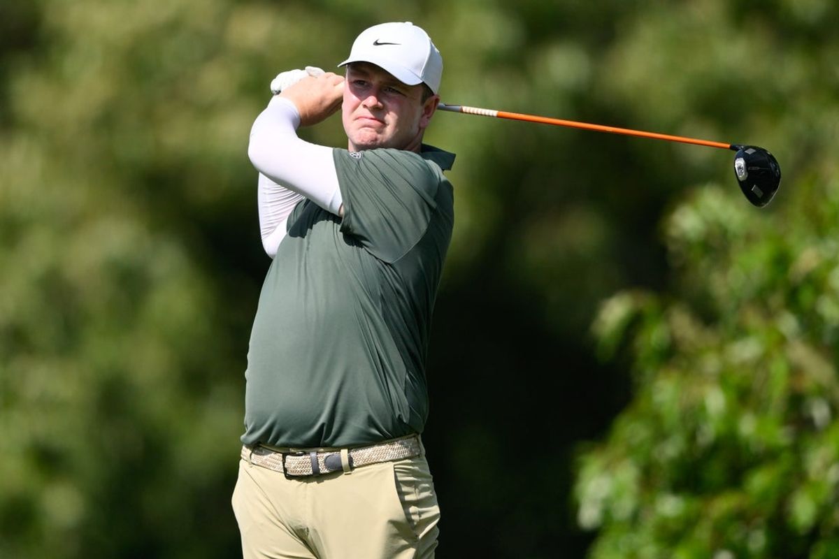 Aug 13, 2026; Memphis, Tennessee, USA; Robert MacIntyre plays his shot from the seventh tee during the first round of the FedEx St. Jude Championship golf tournament. Mandatory Credit: Steve Roberts-Imagn Images