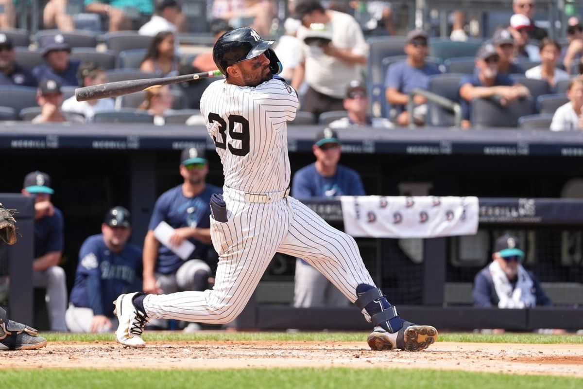 Aug 13, 2026; Bronx, New York, USA; New York Yankees catcher Ali Sanchez (39) hits a single against the Seattle Mariners during the third inning at Yankee Stadium. Mandatory Credit: Gregory Fisher-Imagn Images