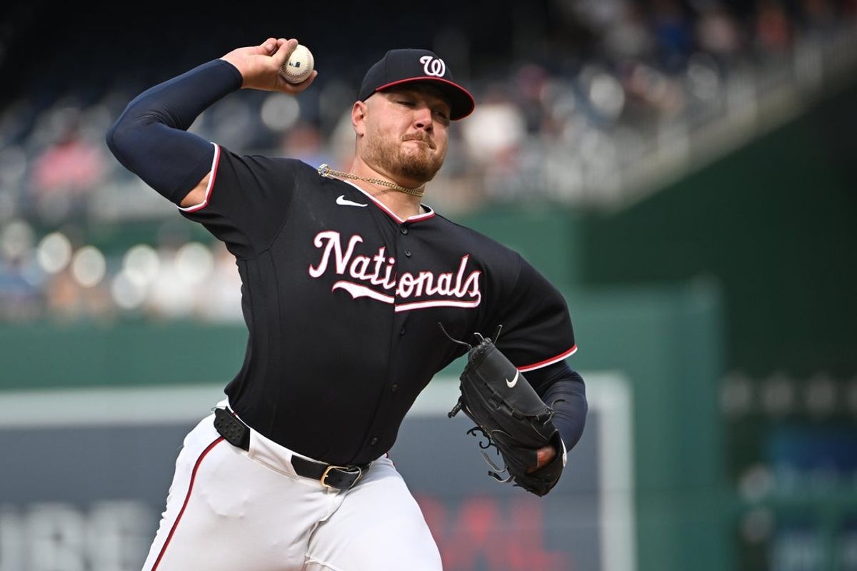Aug 13, 2026; Washington, District of Columbia, USA; Washington Nationals pitcher Cade Cavalli (24) throws to the Chicago Cubs during the first inning at Nationals Park. Mandatory Credit: Brad Mills-Imagn Images