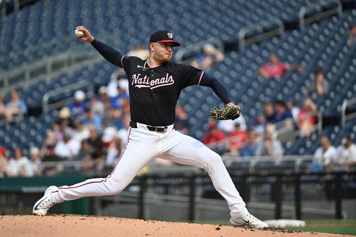 Aug 13, 2026; Washington, District of Columbia, USA; Washington Nationals pitcher Cade Cavalli (24) throws to the Chicago Cubs during the second inning at Nationals Park. Mandatory Credit: Brad Mills-Imagn Images