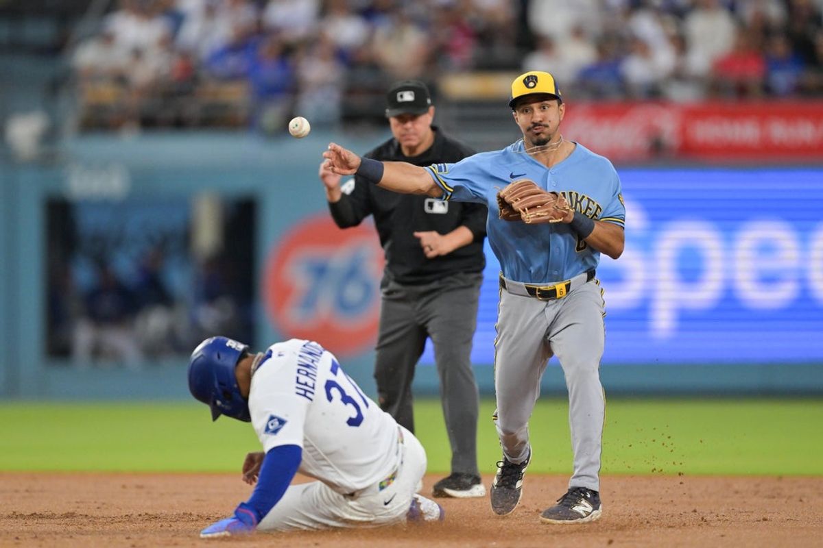 Aug 13, 2026; Los Angeles, California, USA; Milwaukee Brewers shortstop David Hamilton (6) forces Los Angeles Dodgers left fielder Teoscar Hernandez (37) out at second base during the second inning at Dodger Stadium. Mandatory Credit: Jayne Kamin-Oncea-Imagn Images