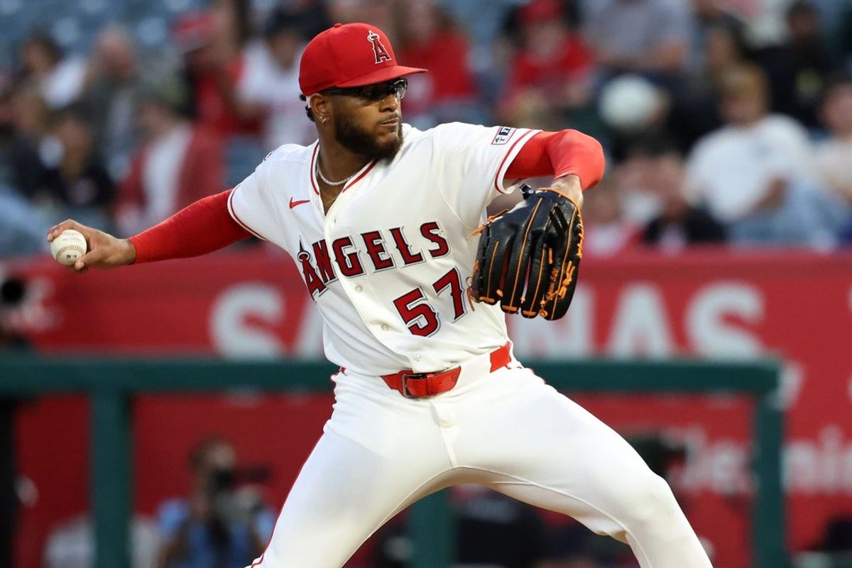 Aug 13, 2026; Anaheim, California, USA;  Los Angeles Angels pitcher Walbert Urena (57) pitches during the second inning against the Texas Rangers at Angel Stadium. Mandatory Credit: Kiyoshi Mio-Imagn Images