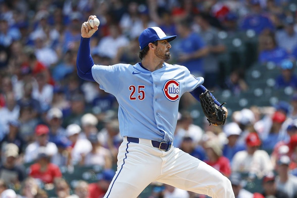 Aug 14, 2026; Chicago, Illinois, USA; Chicago Cubs starting pitcher Clay Holmes (25) delivers a pitch against the St. Louis Cardinals during the first inning at Wrigley Field. Mandatory Credit: Kamil Krzaczynski-Imagn Images