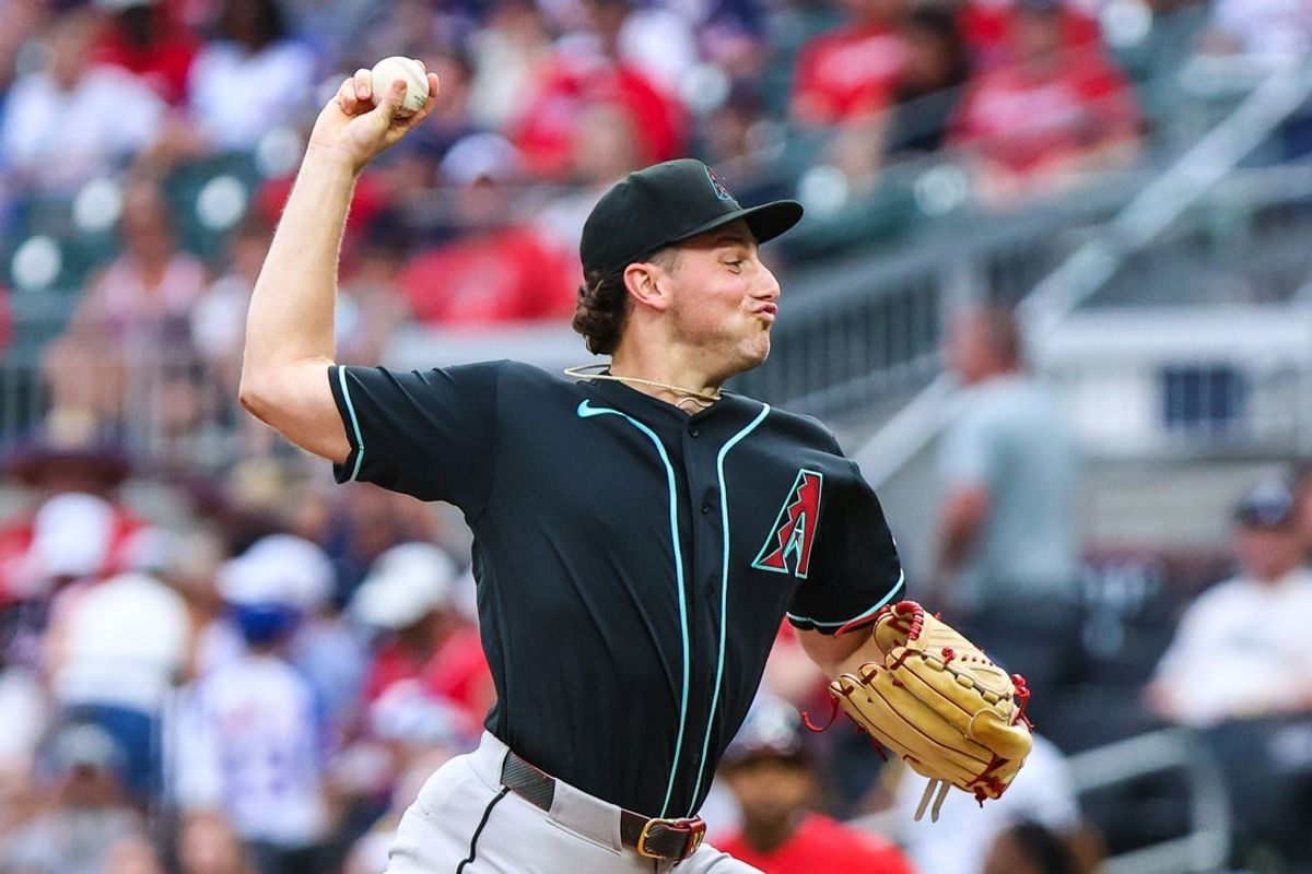 Aug 14, 2026; Cumberland, Georgia, USA; Arizona Diamondbacks pitcher Brandon Pfaadt (32) pitched the ball against the Atlanta Braves during the first inning at Truist Park. Mandatory Credit: Jordan Godfree-Imagn Images