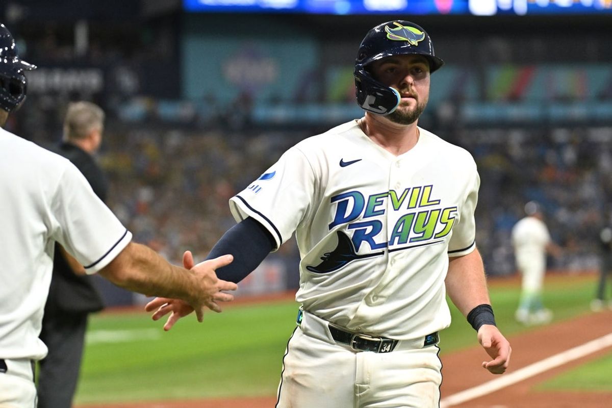 Aug 14, 2026; St. Petersburg, Florida, USA; Tampa Bay Rays catcher Liam Hicks (34) celebrates after scoring a run in the second inning against the Baltimore Orioles at Tropicana Field. Mandatory Credit: Jonathan Dyer-Imagn Images