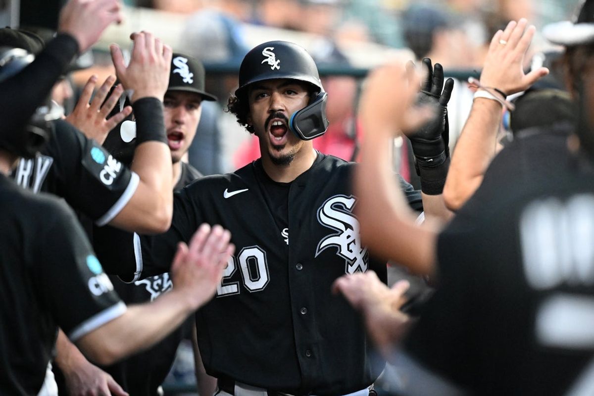 Aug 14, 2026; Detroit, Michigan, USA;  Chicago White Sox third baseman Miguel Vargas (20) celebrates in the dugout after hitting a two-run home run against the Detroit Tigers in the sixth inning at Comerica Park. Mandatory Credit: Lon Horwedel-Imagn Images