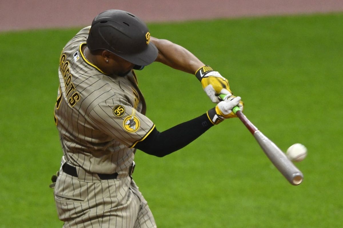 Aug 14, 2026; Cleveland, Ohio, USA; San Diego Padres shortstop Xander Bogaerts (2) hits a two-run home run in the fourth inning against the Cleveland Guardians at Progressive Field. Mandatory Credit: David Richard-Imagn Images