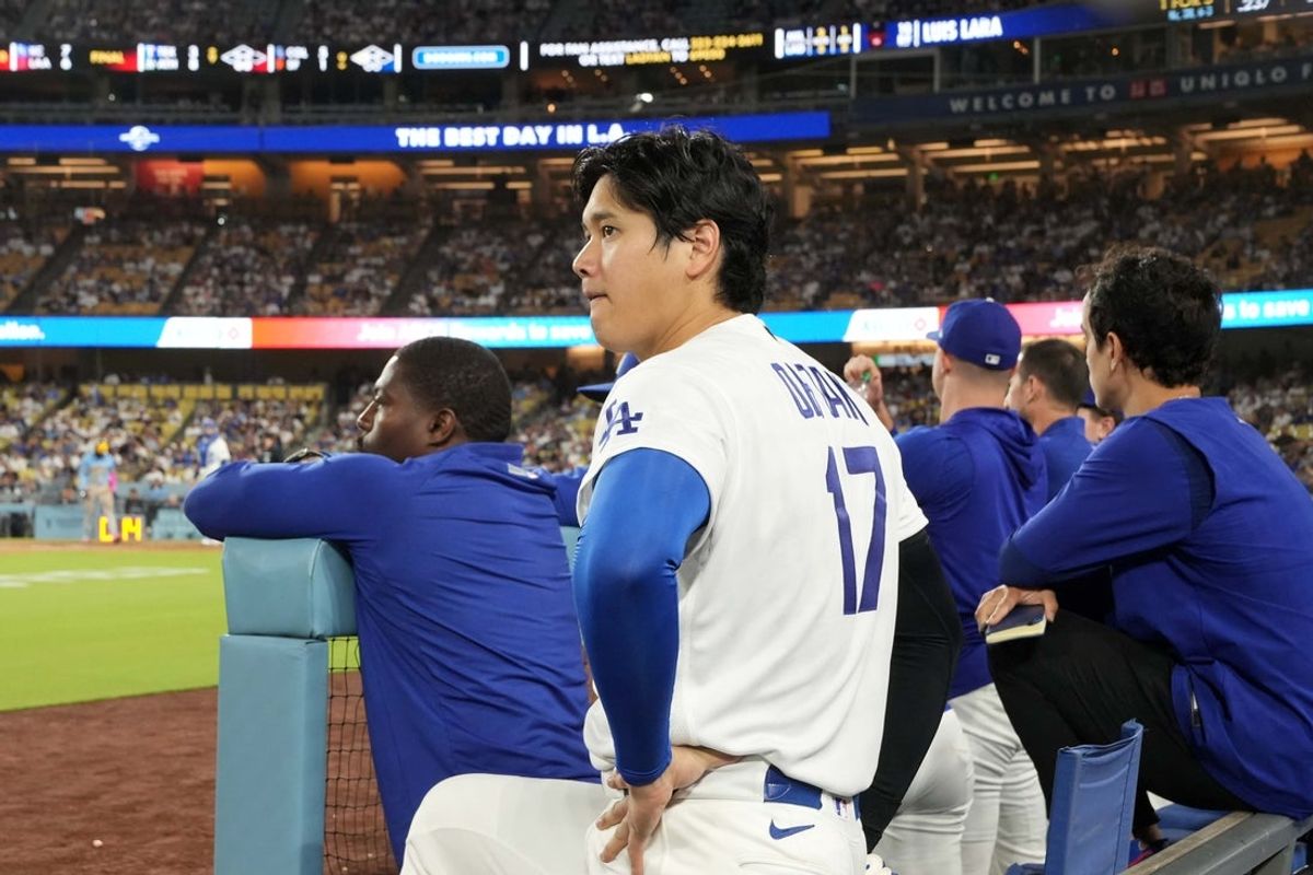 Aug 14, 2026; Los Angeles, California, USA; Los Angeles Dodgers designated hitter Shohei Ohtani (17) watches from the dugout in the ninth inning against the Milwaukee Brewers at Dodger Stadium. Mandatory Credit: Kirby Lee-Imagn Images