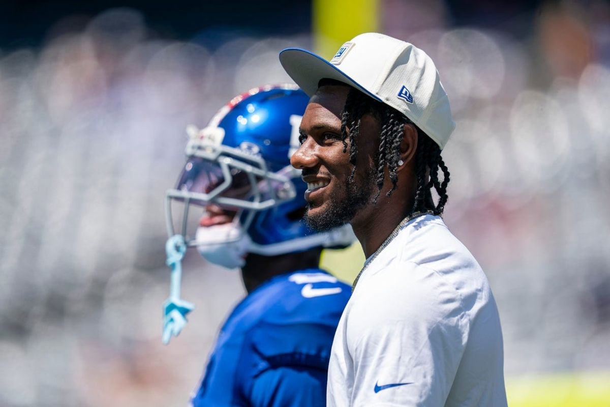 New York Giants wide receiver Malik Nabers (1), not suited up for the game, stands his his teammates during warm ups during a preseason opening game between the New York Giants and Minnesota Vikings on Saturday, Aug. 15, 2026, at MetLife Stadium in East Rutherford, NJ.