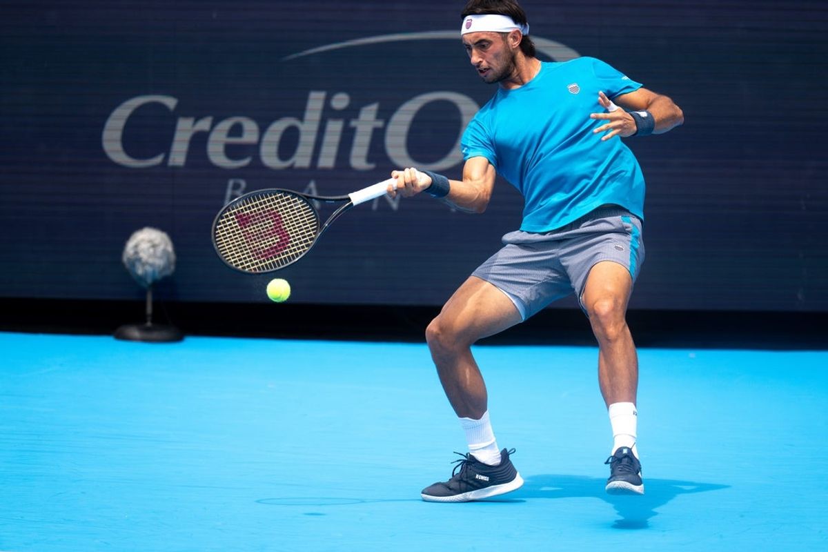 Thiago Agustin Tirante, of Argentina, returns to Novak Djokovic, of Serbia, at the Cincinnati Open at the Lindner Family Tennis Center in Mason, Ohio, on Saturday, August 15, 2026.