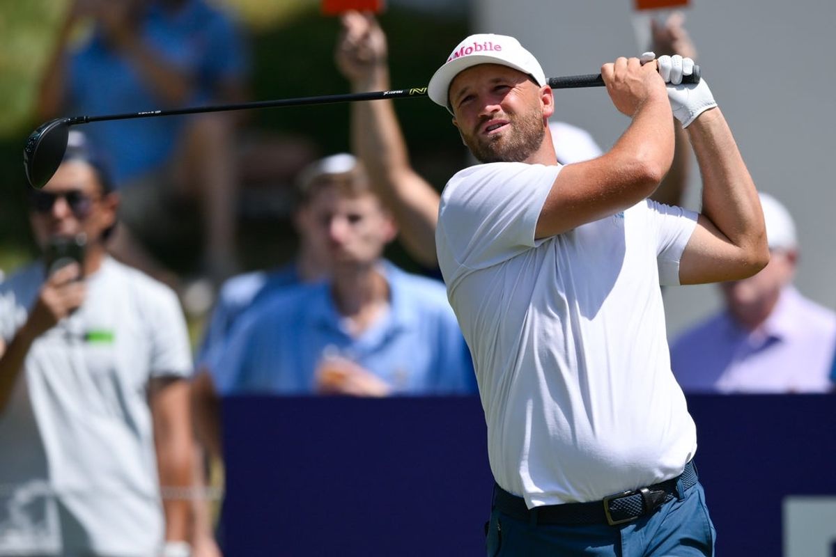 Aug 15, 2026; Memphis, Tennessee, USA; Wyndham Clark plays his shot from the first tee during the third round of the FedEx St. Jude Championship golf tournament. Mandatory Credit: Steve Roberts-Imagn Images