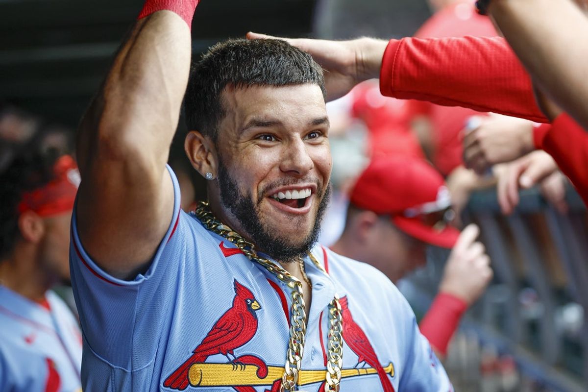 Aug 15, 2026; Chicago, Illinois, USA; St. Louis Cardinals left fielder Joshua Baez (22) celebrates with teammates in the dugout after hitting a two-run home run against the Chicago Cubs during the first inning at Wrigley Field. Mandatory Credit: Kamil Krzaczynski-Imagn Images