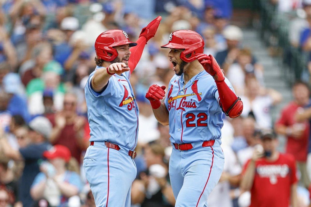 Aug 15, 2026; Chicago, Illinois, USA; St. Louis Cardinals left fielder Joshua Baez (22) celebrates with first baseman Alec Burleson (41) after hitting a two-run home run against the Chicago Cubs during the sixth inning at Wrigley Field. Mandatory Credit: Kamil Krzaczynski-Imagn Images