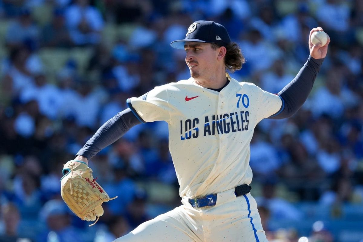 Aug 15, 2026; Los Angeles, California, USA; Los Angeles Dodgers pitcher Justin Wrobleski (70) throw a pitch against the Milwaukee Brewers during the second inning at Dodger Stadium. Mandatory Credit: Kirby Lee-Imagn Images