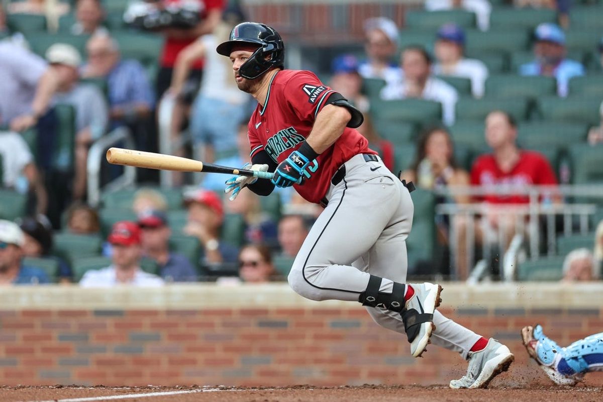 Aug 15, 2026; Cumberland, Georgia, USA; Arizona Diamondbacks left fielder Tim Tawa (13) hits an RBI single against the Atlanta Braves in the second inning at Truist Park. Mandatory Credit: Colin Hubbard-Imagn Images