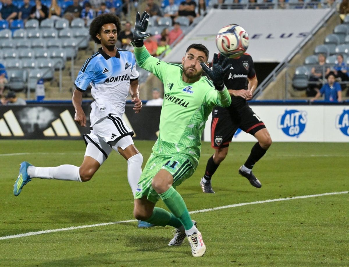 Aug 15, 2026; Montreal, Province of Quebec, CAN; CF Montreal goalkeeper Thomas Gillier (31) makes a save against D.C. United during the first half at Saputo Stadium. Mandatory Credit: Eric Bolte-Imagn Images