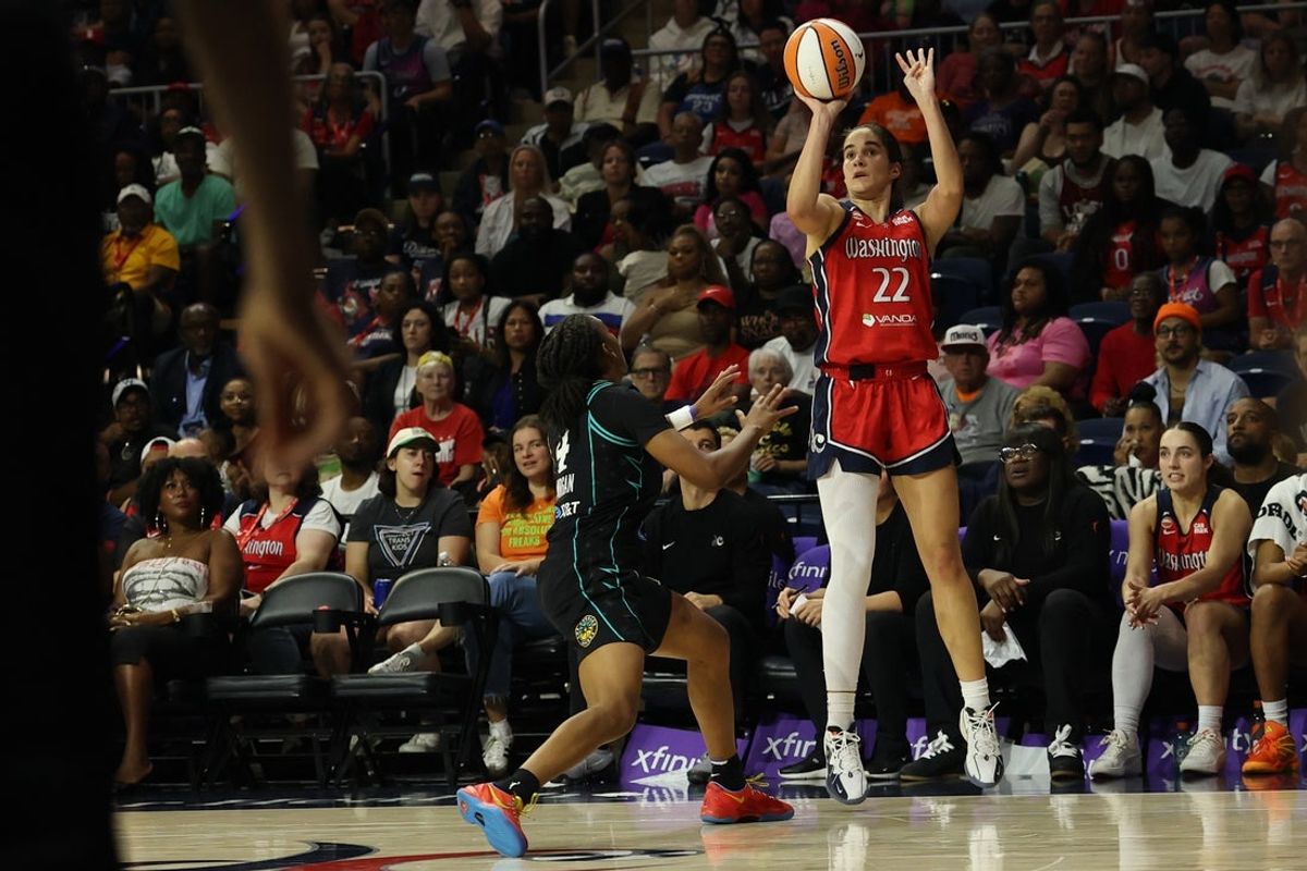Aug 15, 2026; Washington, District of Columbia, USA; Washington Mystics guard Sonia Citron (22) shoots the ball as Los Angeles Sparks guard Tonie Morgan (4) defends in the second half at CareFirst Arena. Mandatory Credit: Geoff Burke-Imagn Images