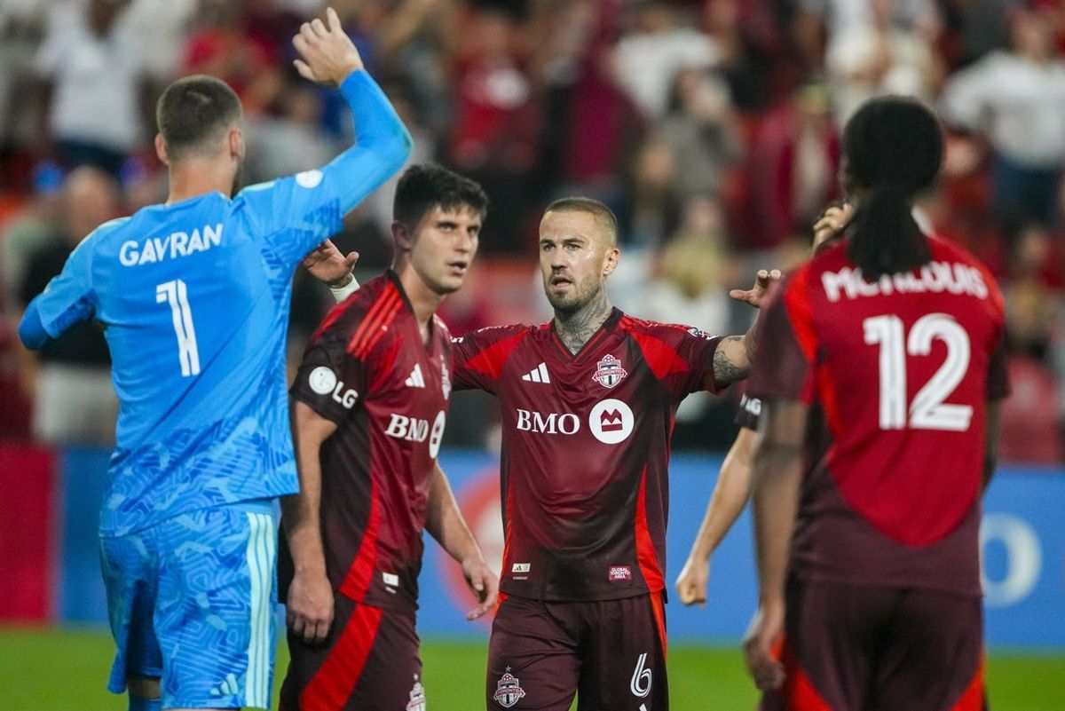 Aug 15, 2026; Toronto, Ontario, CAN; Toronto FC midfield Niklas Dorsch (6) celebrates with teammates after defeating the New England Revolution at BMO Field. Mandatory Credit: Kevin Sousa-Imagn Images