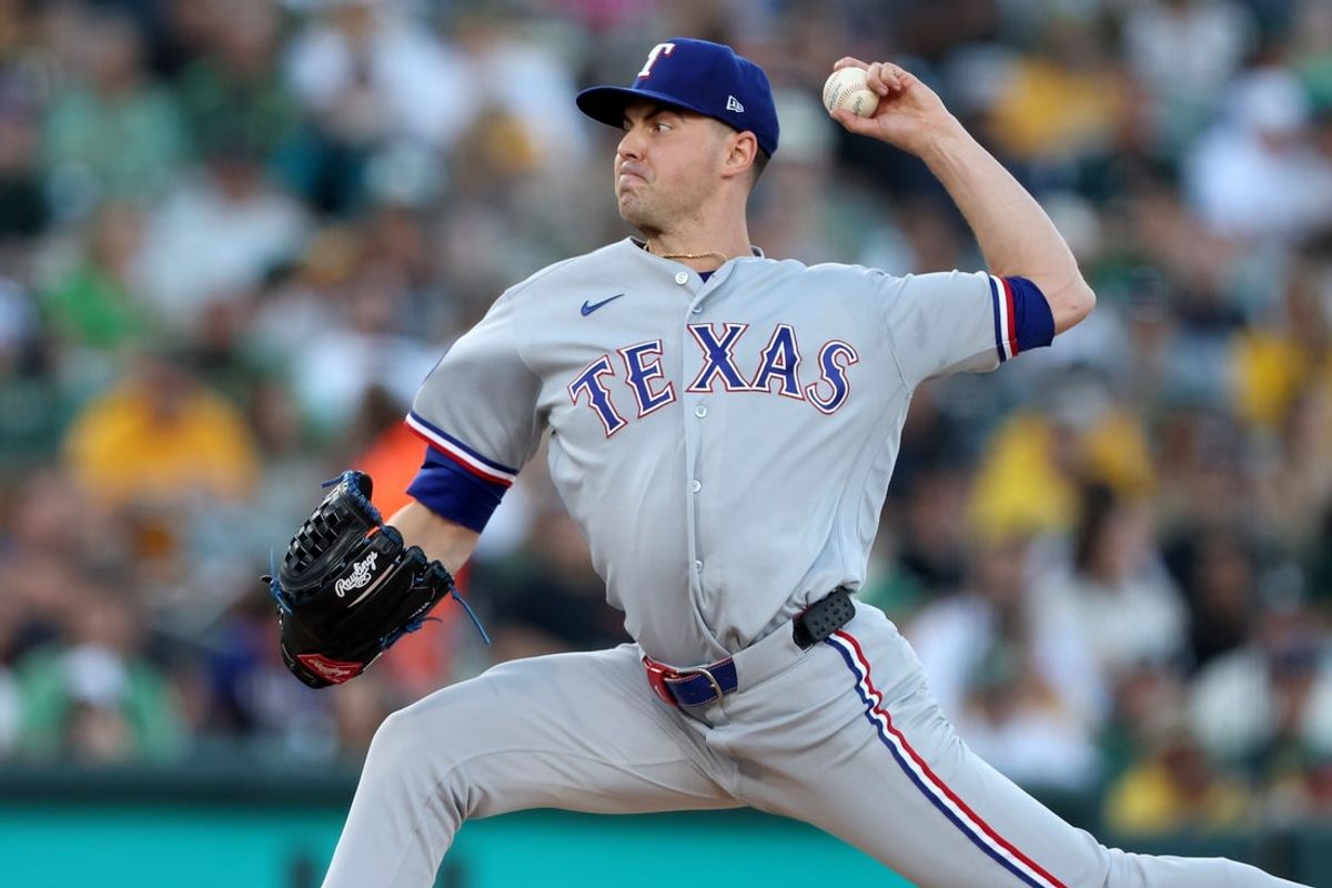 Aug 15, 2026; West Sacramento, California, USA; Texas Rangers starting pitcher MacKenzie Gore (1) throws a pitch against the Athletics during the second inning at Sutter Health Park. Mandatory Credit: Dennis Lee-Imagn Images