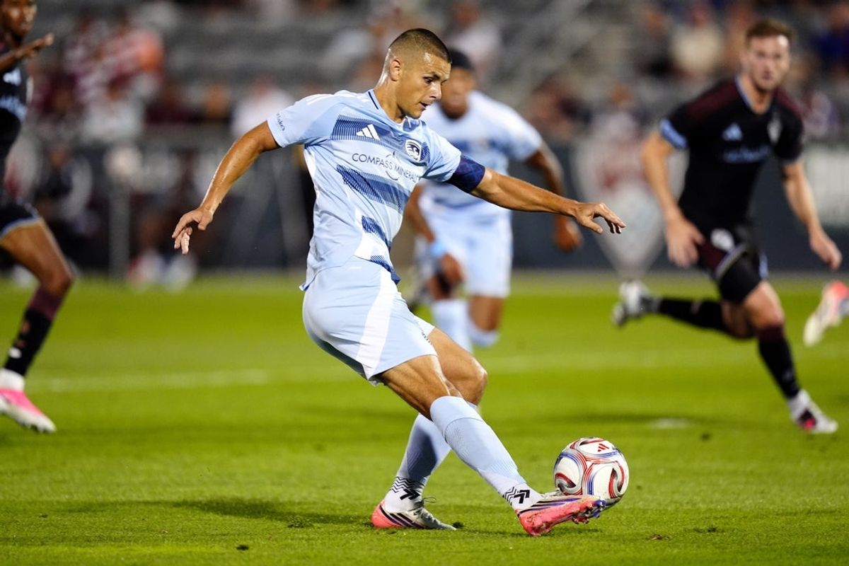 Aug 15, 2026; Commerce City, Colorado, USA; Sporting Kansas City offense Dejan Joveljic (9) kicks the ball in the first half against the Colorado Rapids at Dick's Sporting Goods Park. Mandatory Credit: Ron Chenoy-Imagn Images