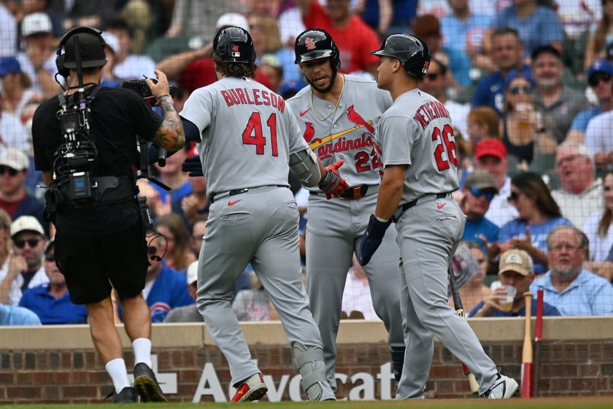 Aug 16, 2026; Chicago, Illinois, USA; St. Louis Cardinals first baseman Alec Burleson (41) celebrates with teammates after hitting a two-run home run against the Chicago Cubs during the first inning at Wrigley Field. Mandatory Credit: Patrick Gorski-Imagn Images