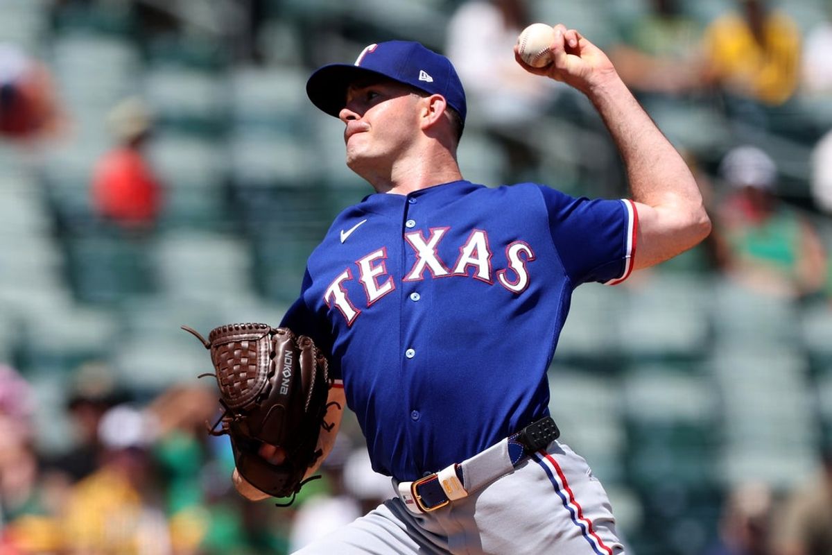 Aug 16, 2026; West Sacramento, California, USA; Texas Rangers starting pitcher Cody Bradford (61) throws a pitch against the Athletics during the first inning at Sutter Health Park. Mandatory Credit: Dennis Lee-Imagn Images