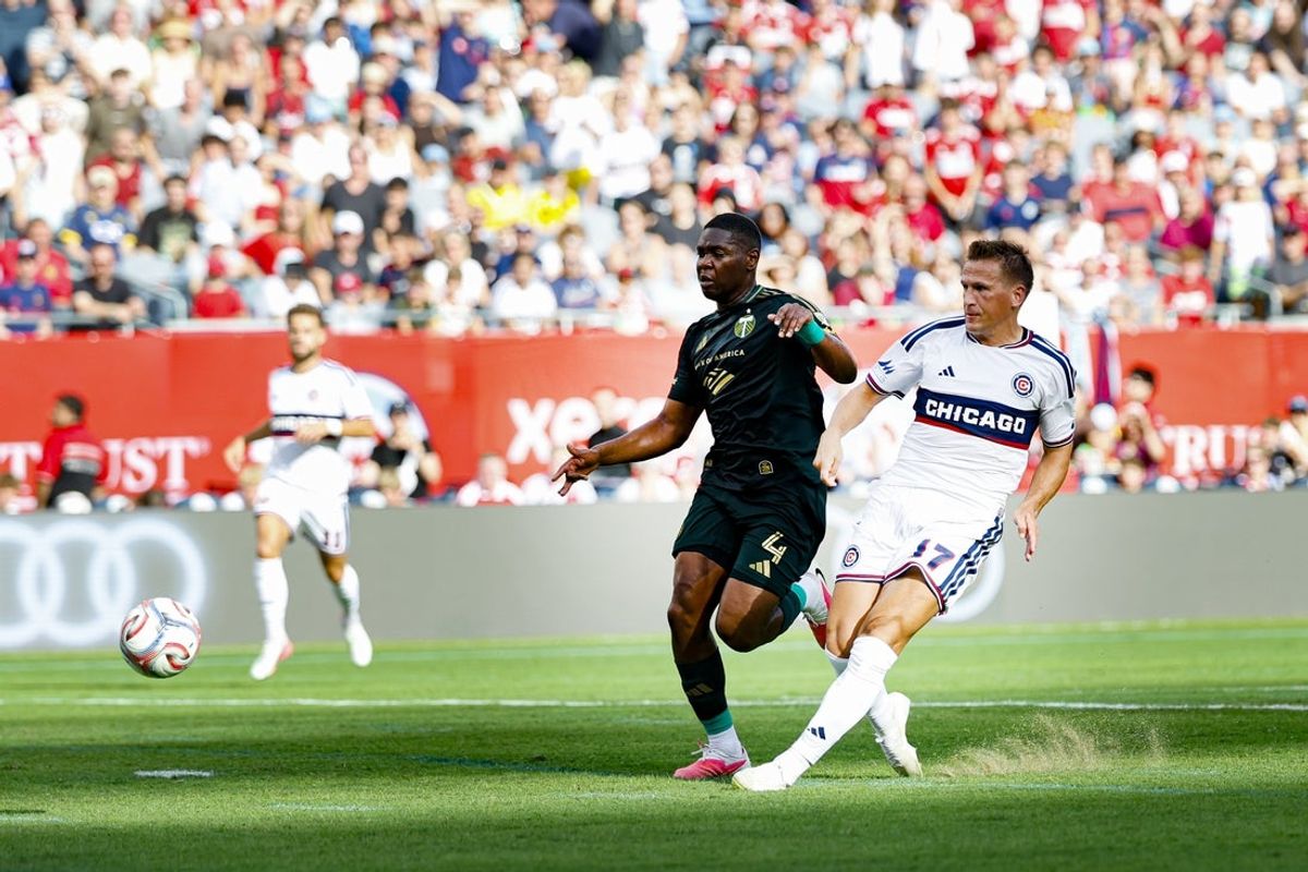 Aug 16, 2026; Chicago, Illinois, USA; Chicago Fire FC midfield Robin Lod (17) scores a goal during the first half of a MLS game against the Portland Timbers at Soldier Field. Mandatory Credit: Kamil Krzaczynski-Imagn Images
