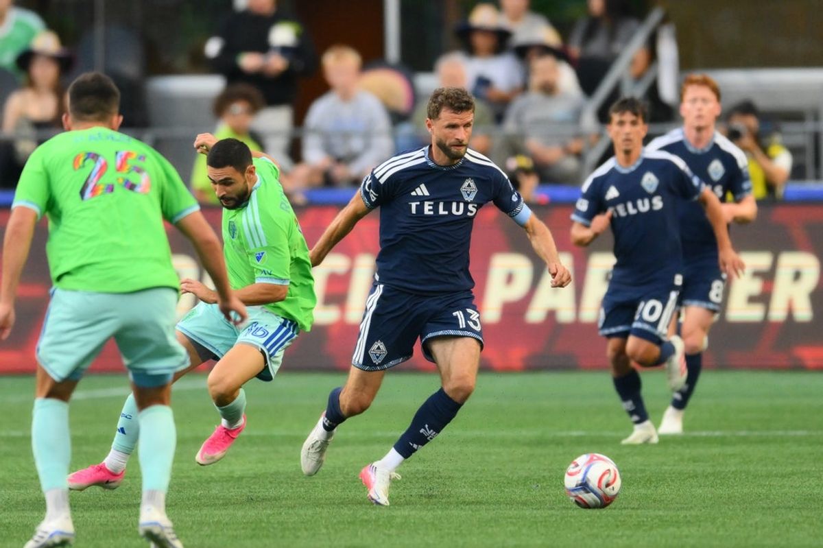 Aug 16, 2026; Seattle, Washington, USA; Vancouver Whitecaps FC forward Thomas Muller (13) advances the ball against the Seattle Sounders FC during the first half at Lumen Field. Mandatory Credit: Steven Bisig-Imagn Images