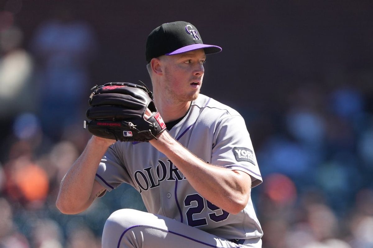 Aug 15, 2026; San Francisco, California, USA; Colorado Rockies pitcher Tanner Gordon (29) throws a pitch against the San Francisco Giants during the seventh inning at Oracle Park. Mandatory Credit: Darren Yamashita-Imagn Images