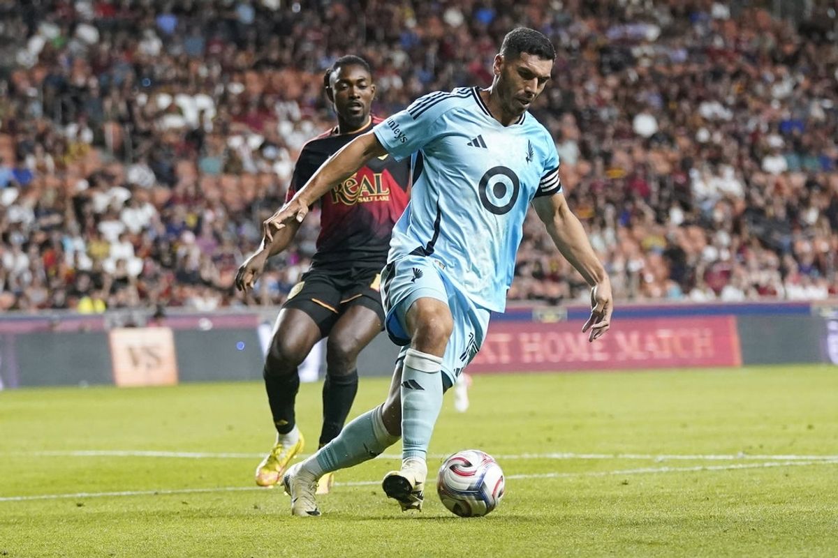 Aug 15, 2026; Sandy, Utah, USA; Minnesota United FC defender Michael Boxall (15) controls the ball while being defended by Real Salt Lake forward Victor Olatunji (17) in the second half at America First Field. Mandatory Credit: Aaron Baker-Imagn Images