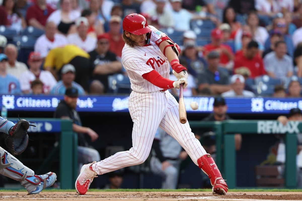 Aug 18, 2026; Philadelphia, Pennsylvania, USA; Philadelphia Phillies third baseman Alec Bohm (28) hits a RBI single against the Miami Marlins during the first inning at Citizens Bank Park. Mandatory Credit: Bill Streicher-Imagn Images