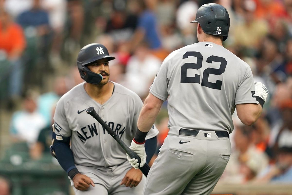 Aug 18, 2026; Baltimore, Maryland, USA; New York Yankees outfielder Trent Grisham (12) greeted by designated hitter Ben Rice (22) after connecting on a solo home run during the third inning against the Baltimore Orioles at Oriole Park at Camden Yards. Mandatory Credit: Mitch Stringer-Imagn Images