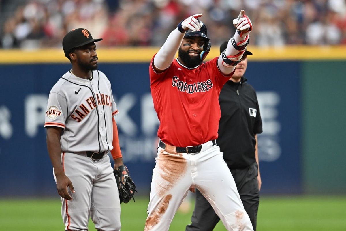 Aug 18, 2026; Cleveland, Ohio, USA; Cleveland Guardians right fielder Jo Adell (7) celebrates after an RBI hit during the fourth inning against the San Francisco Giants at Progressive Field. Mandatory Credit: Ken Blaze-Imagn Images