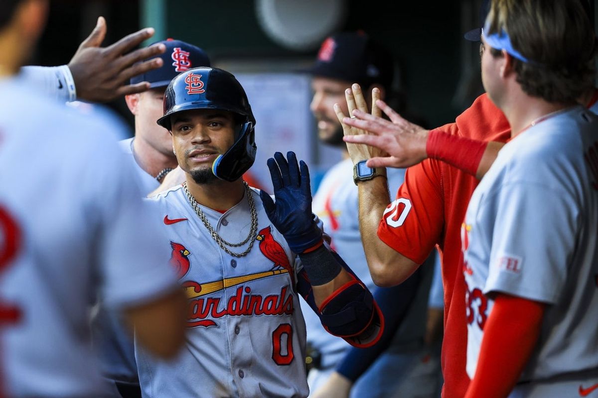 Aug 18, 2026; Cincinnati, Ohio, USA; St. Louis Cardinals shortstop Masyn Winn (0) high fives teammates after hitting a solo home run in the fifth inning against the Cincinnati Reds at Great American Ball Park. Mandatory Credit: Katie Stratman-Imagn Images