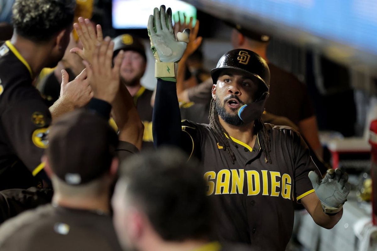 Aug 18, 2026; New York City, New York, USA; San Diego Padres right fielder Fernando Tatis Jr. (23) celebrates his two run home run against the New York Mets with teammates in the dugout during the fifth inning at Citi Field. Mandatory Credit: Brad Penner-Imagn Images