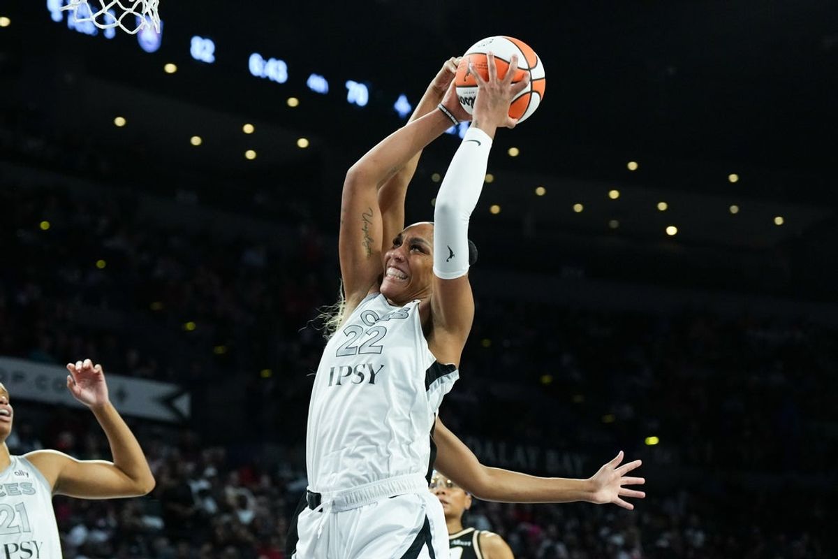 Aug 18, 2026; Las Vegas, Nevada, USA; Las Vegas Aces center A'ja Wilson (22) grabs a rebound against the Atlanta Dream in the fourth quarter at Michelob Ultra Arena. Mandatory Credit: Candice Ward-Imagn Images