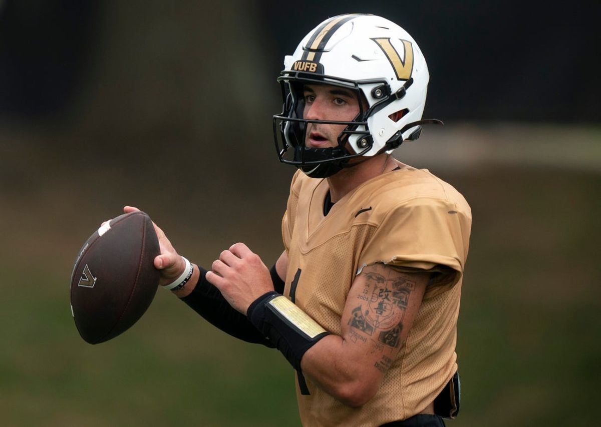 Vanderbilt quarterback Blaze Berlowitz (1) throws during practice at Vanderbilt University’s McGugin Center practice fields Wednesday, Aug. 19, 2026.